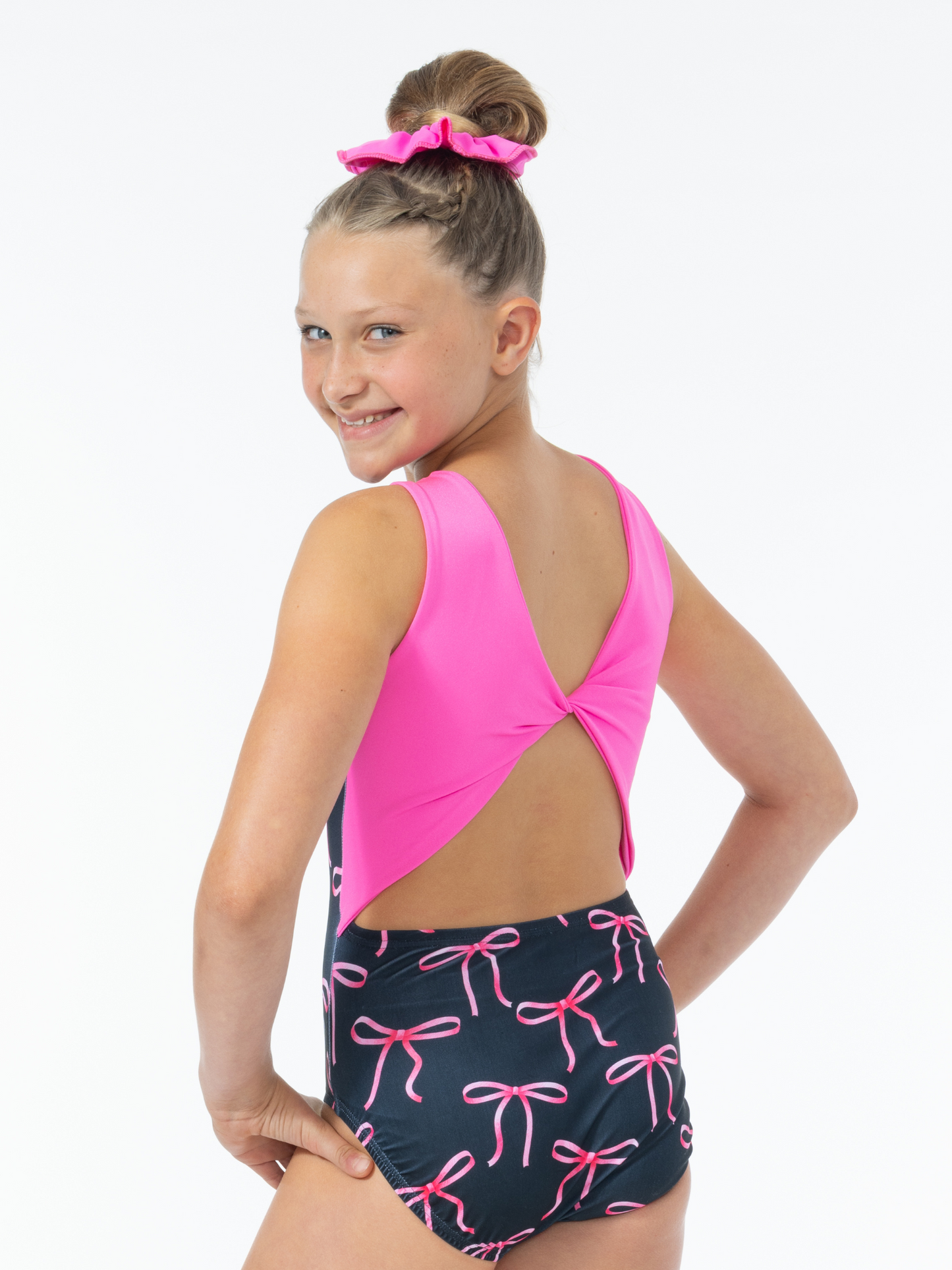 Bow themed gymnastics leotard. Made in the USA. Bow print gymnastics outfit.